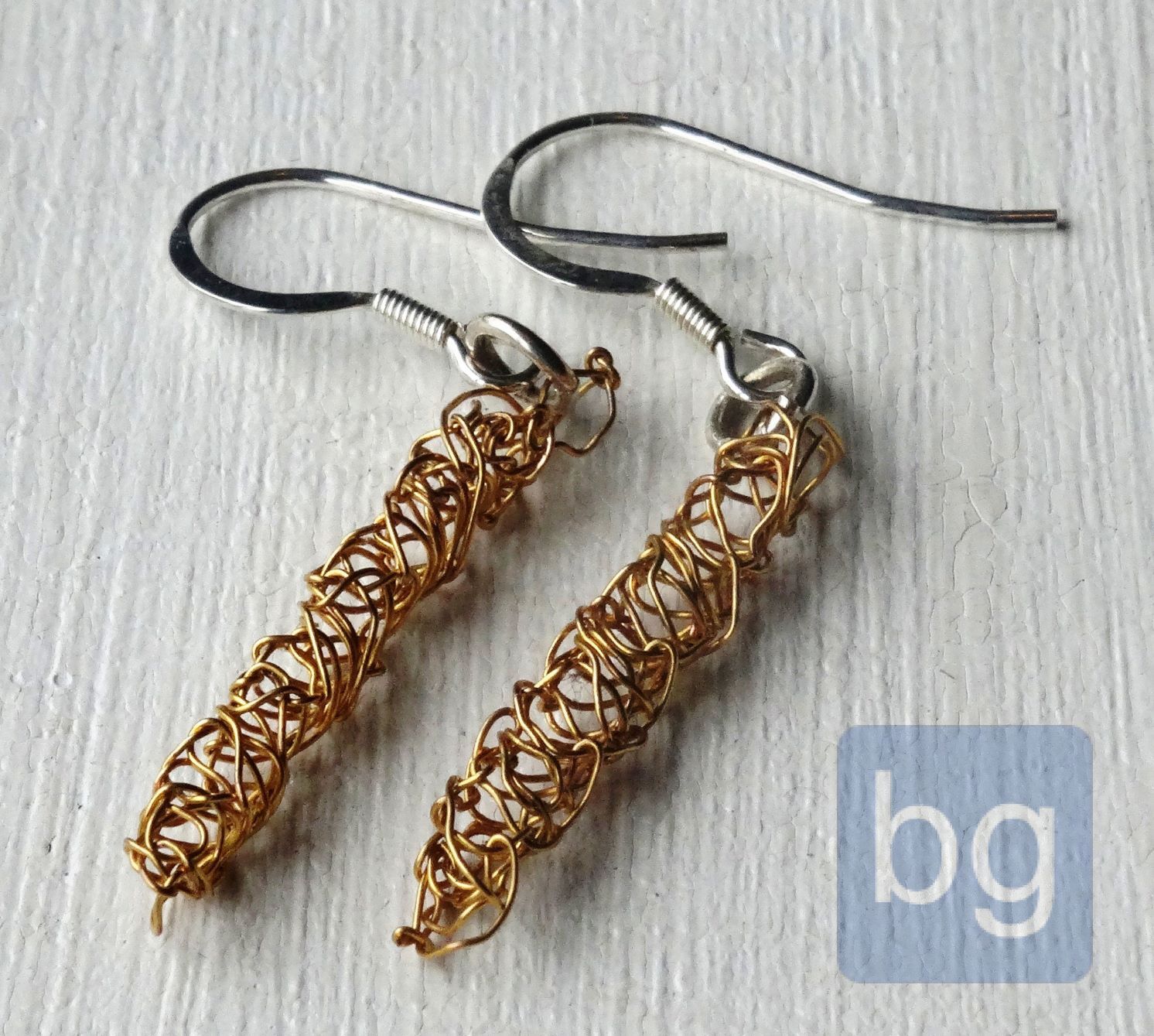 gold plated twist earrings 1